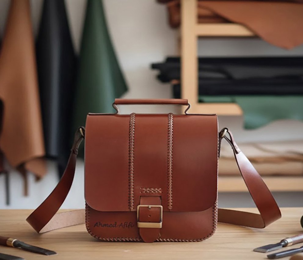 1 شنط رجالى جلد طبيعى - الصورة 1